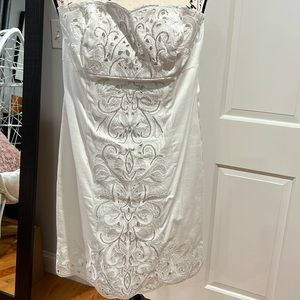 White mini dress with silver detail. Strapless